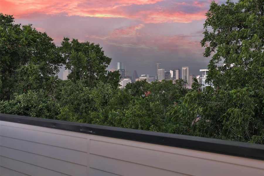 Enjoy elevated living with a beautifully finished wooden rooftop deck, perfect for entertaining and private barbecues against a stunning city backdrop.