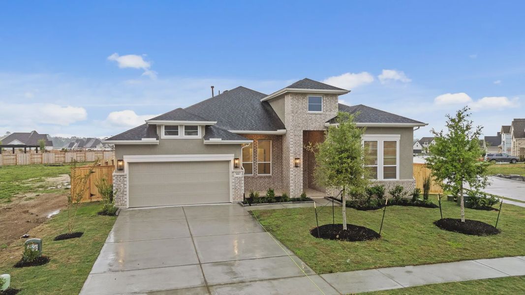 Front exterior of a new home in Briarley, Montgomery, TX, highlighting curb appeal (Image 19). Front exterior of a new home in Briarley, Montgomery, TX, highlighting curb appeal (Image 19).