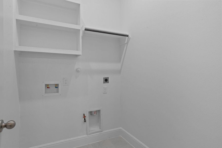 Spacious, unfurnished interior of a new home in Coastal Point, League City (Image 28). Spacious, unfurnished interior of a new home in Coastal Point, League City (Image 28).