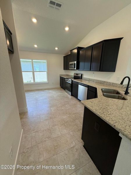 Furnished interior view inside a new home in Winding Oaks, Weeki Wachee (Image 3).