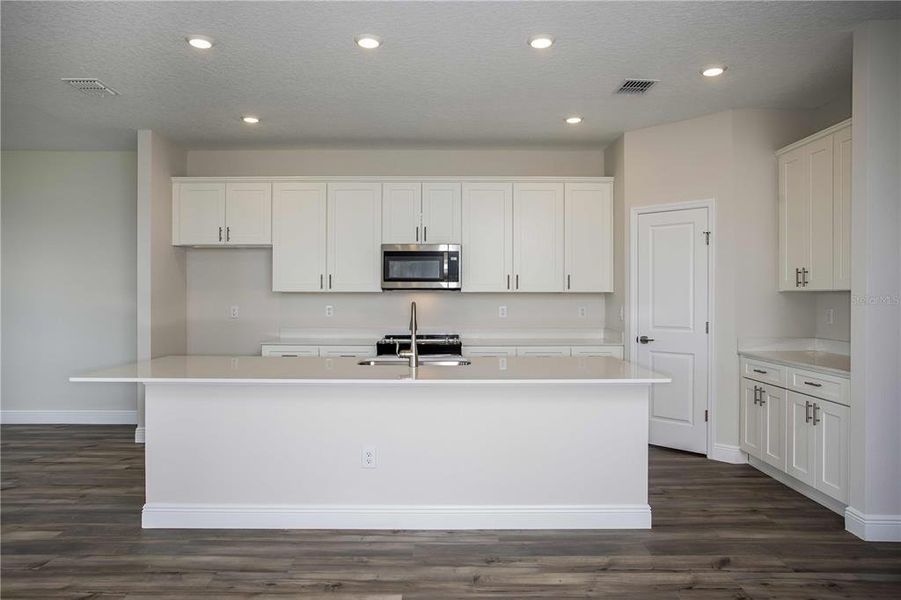 Furnished interior view inside a new home in Pasadena Woods, Wesley Chapel (Image 5). Furnished interior view inside a new home in Pasadena Woods, Wesley Chapel (Image 5).