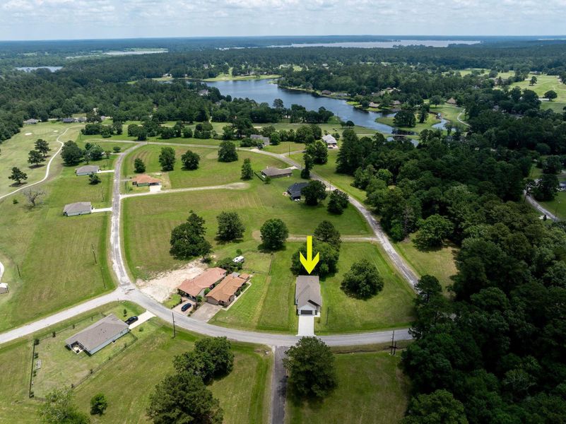 Front exterior of a new home in , Trinity, TX, highlighting curb appeal (Image 24).