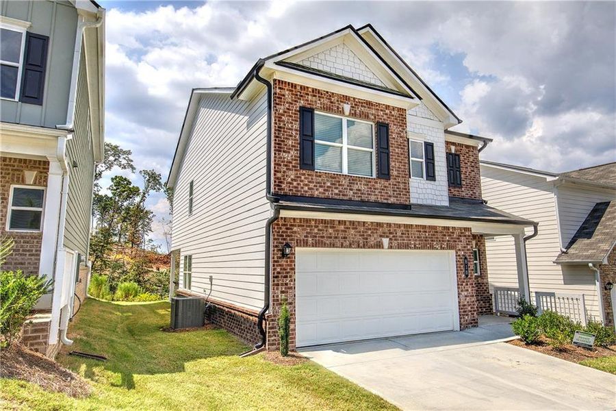 Front exterior of a new home in , Cartersville, GA, highlighting curb appeal (Image 26).