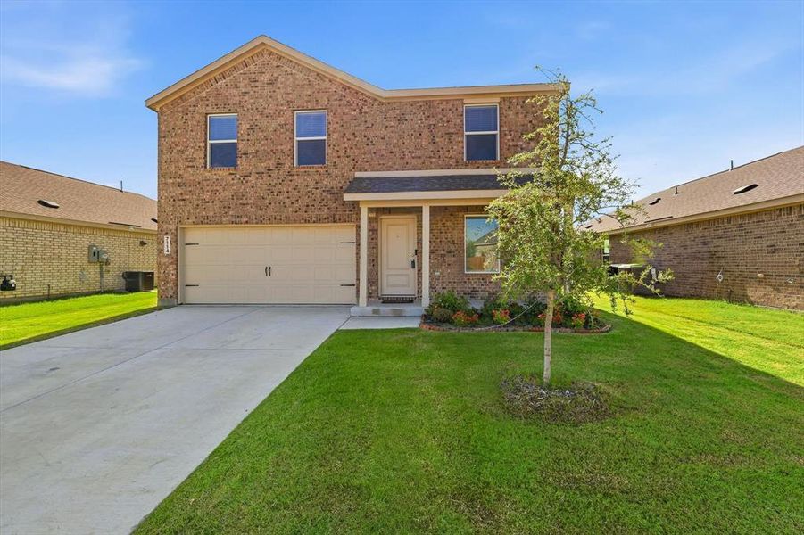 Front exterior of a new home in Mobberly Farms, Pilot Point, TX, highlighting curb appeal (Image 2). Front exterior of a new home in Mobberly Farms, Pilot Point, TX, highlighting curb appeal (Image 2).