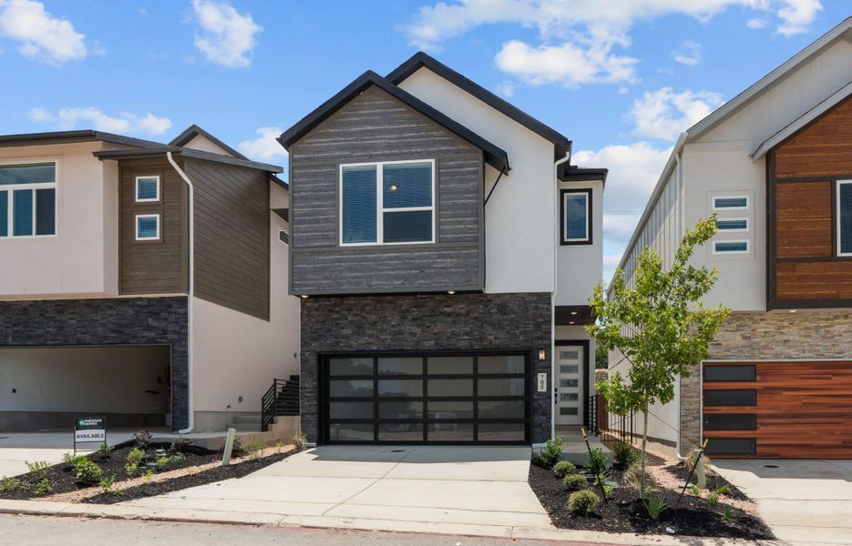 Representative exterior photo of a completed home built from the Balder by Chesmar Homes in Centero at Stone Oak, San Antonio, TX (Image 9).