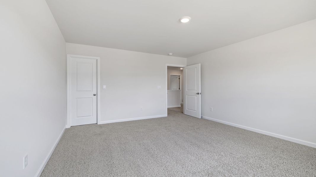 Spacious, unfurnished interior of a new home in Durbin Meadows Traditions, Fountain Inn (Image 26).
