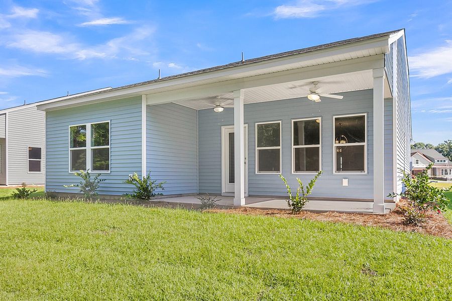 Exterior details and patio area of a home in Fairway Woods at Wyboo, Manning (Image 4).