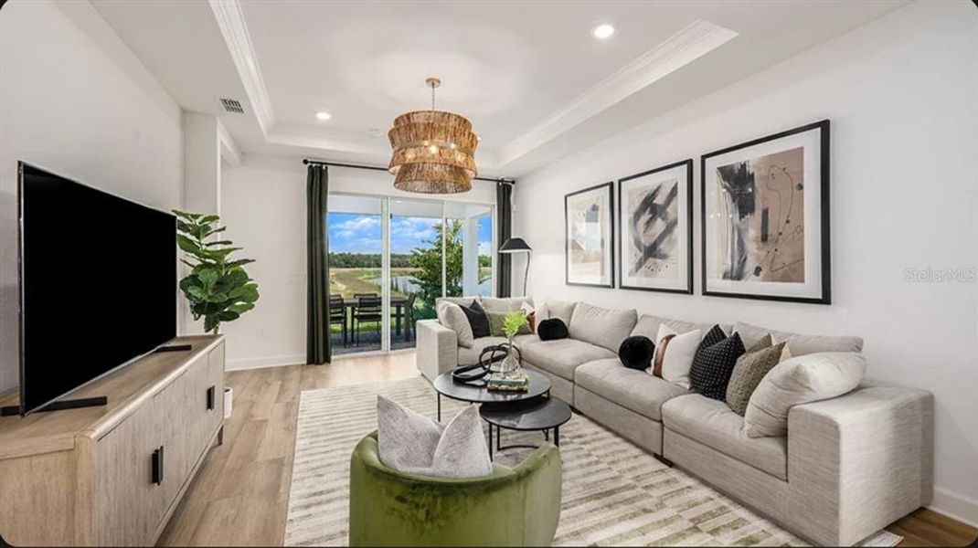 Furnished interior view inside a new home in Westview Community Group Page, Kissimmee (Image 5).