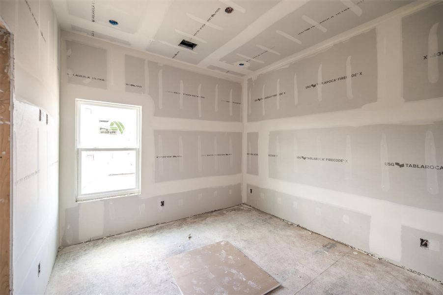 Also located on the third floor is a secondary bedroom also with its own en-suite bath.