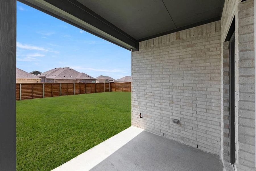 Exterior details and patio area of a home in Solterra, Mesquite (Image 4).