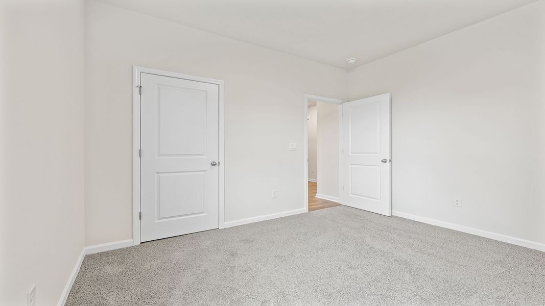 Spacious, unfurnished interior of a new home in Durbin Meadows Traditions, Fountain Inn (Image 16).