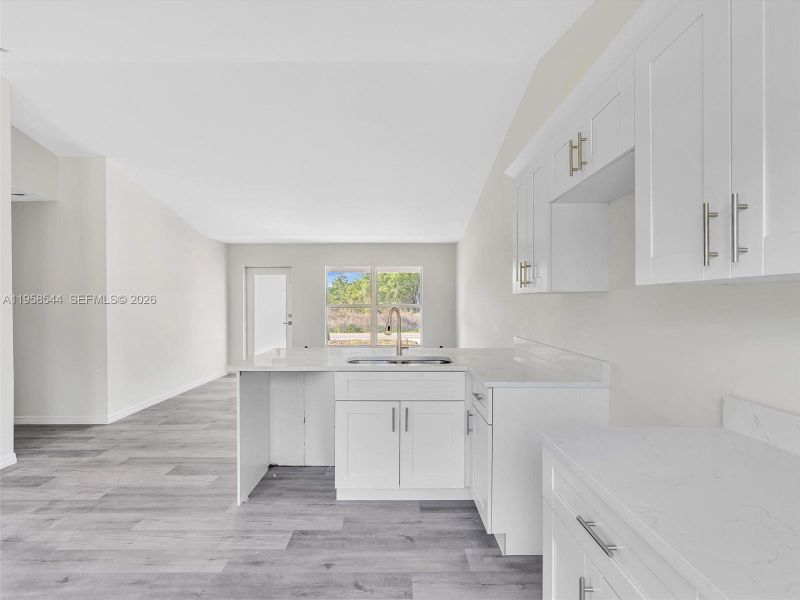 Furnished interior view inside a new home in , Lehigh Acres (Image 6).