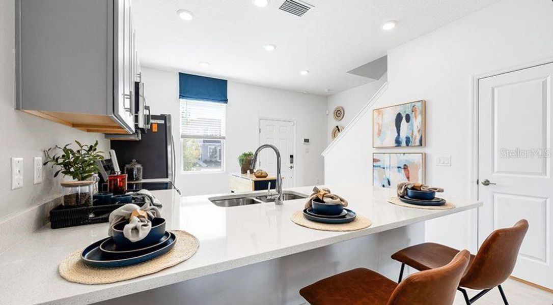 Furnished interior view inside a new home in The Townhomes at Azario Lakewood Ranch, Bradenton (Image 16). Furnished interior view inside a new home in The Townhomes at Azario Lakewood Ranch, Bradenton (Image 16).