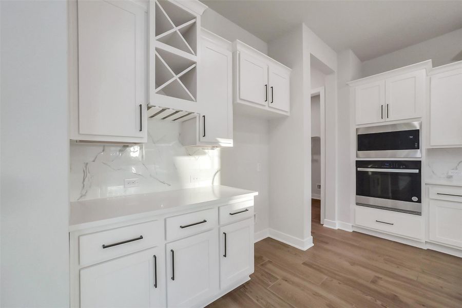 Furnished interior view inside a new home in Meridiana, Manvel (Image 11).