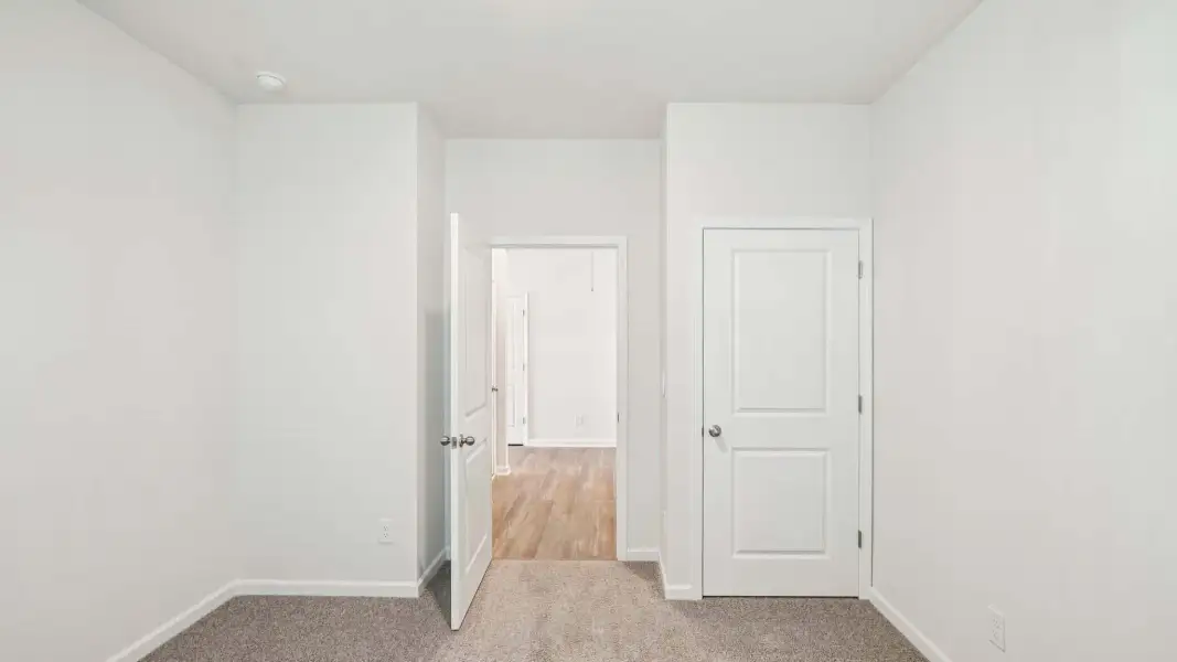 Representative unfurnished interior of a home built from the Cali by D.R. Horton in Sweetwater Village, Rockwell (Image 29).