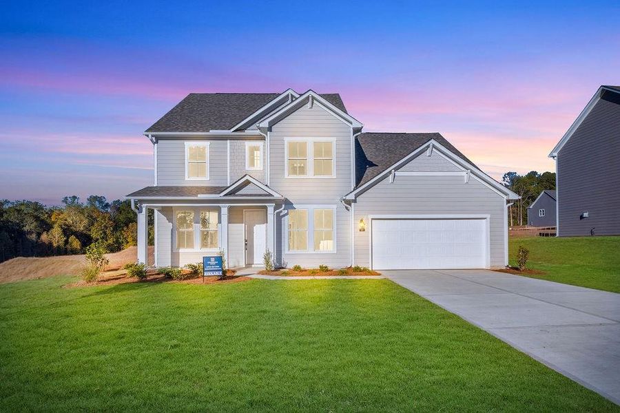Front exterior of a new home in Pickens Bluff, Hiram, GA, highlighting curb appeal (Image 18). Front exterior of a new home in Pickens Bluff, Hiram, GA, highlighting curb appeal (Image 18).