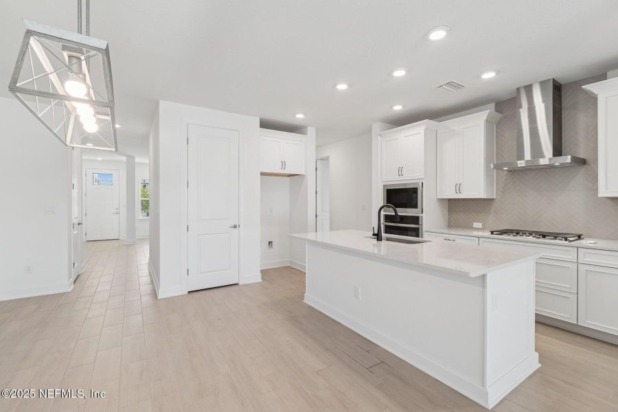 Furnished interior view inside a new home in Evergreen Island at Silverleaf - Classic, St. Augustine (Image 4).