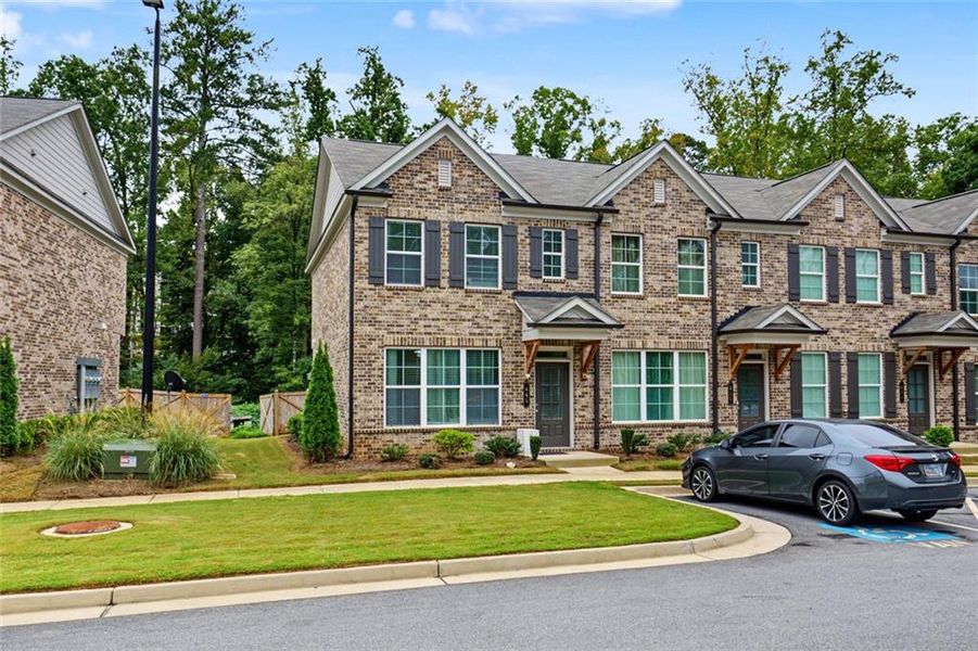 Front exterior of a new home in , Lawrenceville, GA, highlighting curb appeal (Image 20).