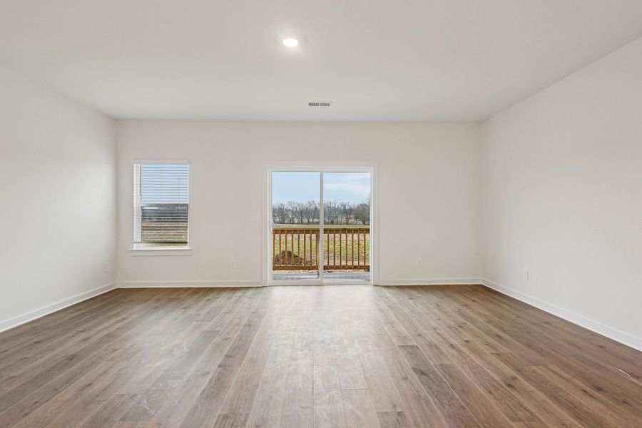 Spacious, unfurnished interior of a new home in Greystone - Highland Townhomes, Smyrna (Image 11).