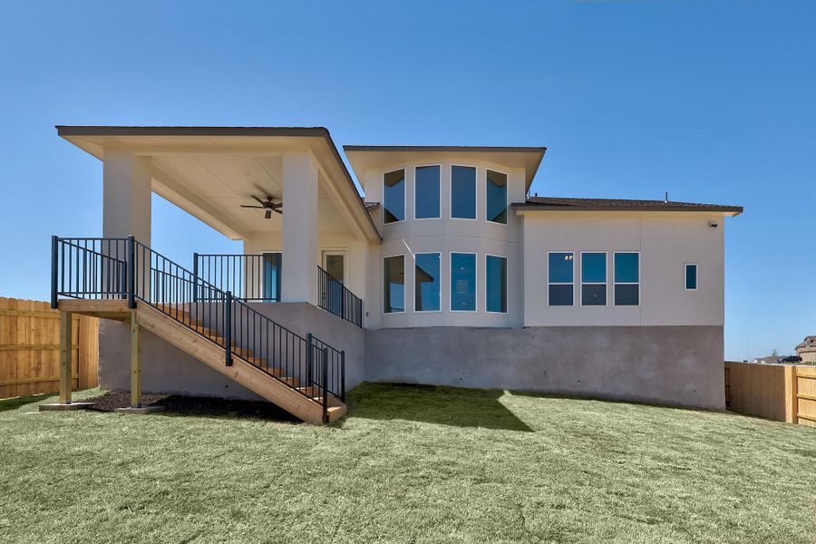 Exterior details and patio area of a home in Lariat, Liberty Hill (Image 4).