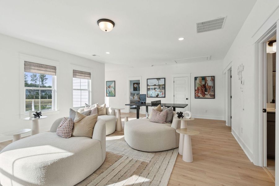 Furnished interior view inside a new home in Tidewater at Lakes of Cane Bay, Summerville (Image 8).