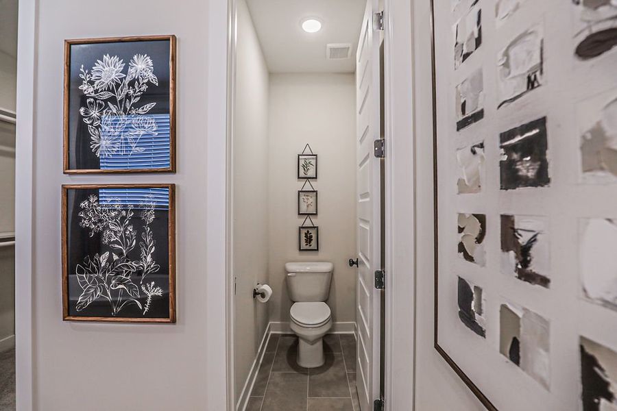 Representative furnished interior of a home built from the Ashmont by Grant & Co in Walker Farms, Bartlett (Image 28).