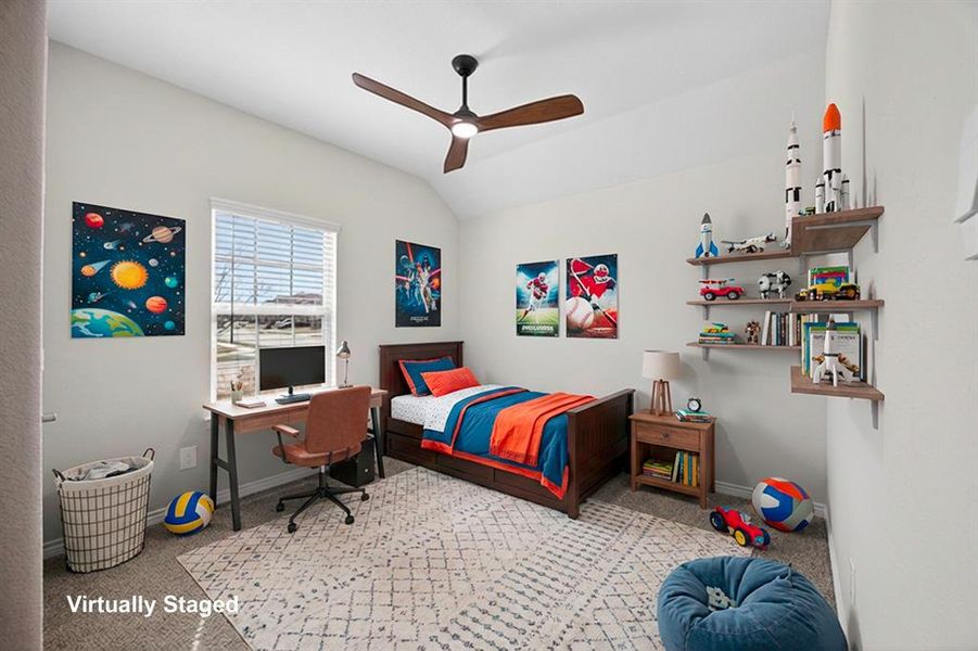 Bedroom featuring light colored carpet, an office area, ceiling fan, and lofted ceiling