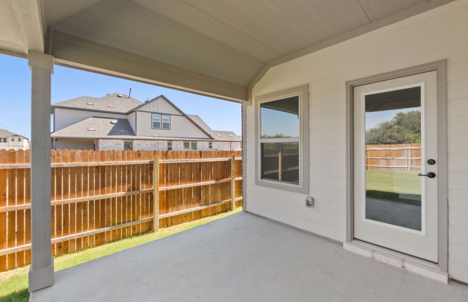 Exterior details and patio area of a home in Saddleback at Santa Rita Ranch, Liberty Hill (Image 4). Exterior details and patio area of a home in Saddleback at Santa Rita Ranch, Liberty Hill (Image 4).