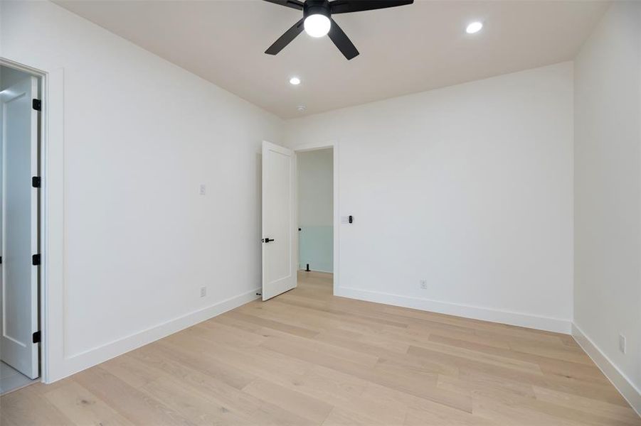 Unfurnished room featuring light wood-style floors, recessed lighting, and a ceiling fan Unfurnished room featuring light wood-style floors, recessed lighting, and a ceiling fan