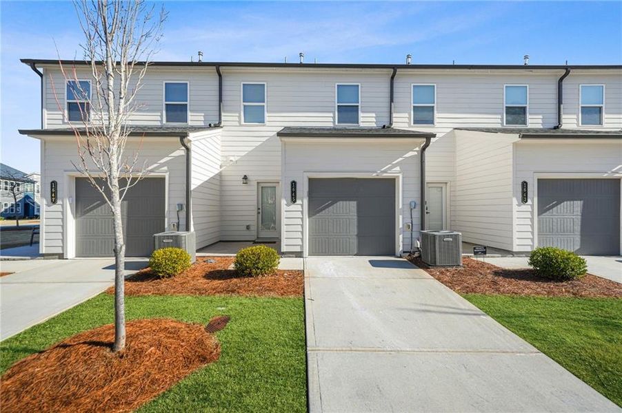 Front exterior of a new home in , Atlanta, GA, highlighting curb appeal (Image 24).