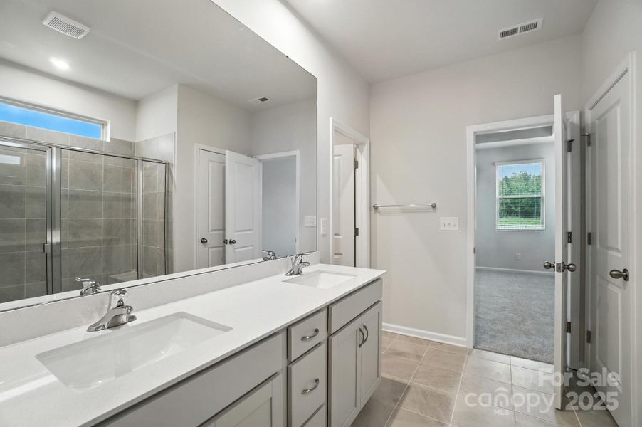 Furnished interior view inside a new home in Waxhaw Landing, Monroe (Image 6).