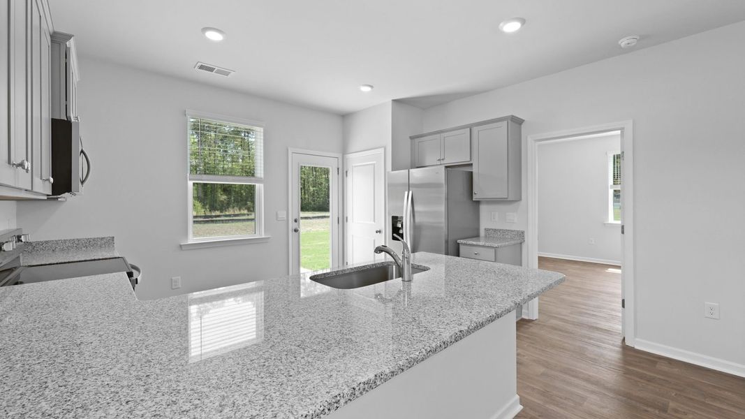 Representative furnished interior of a home built from the PERRY by D.R. Horton in North Shore, Summerton (Image 5).