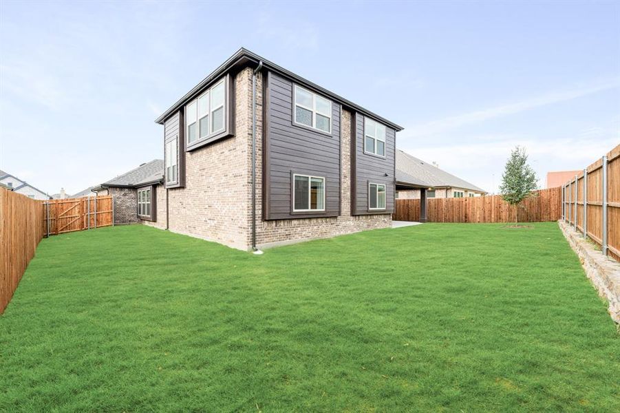 Front exterior of a new home in West Crossing, Anna, TX, highlighting curb appeal (Image 1). Front exterior of a new home in West Crossing, Anna, TX, highlighting curb appeal (Image 1).