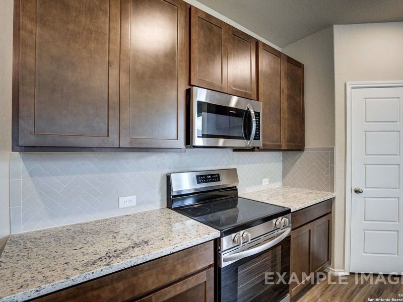 Furnished interior view inside a new home in Comanche Ridge, San Antonio (Image 4).