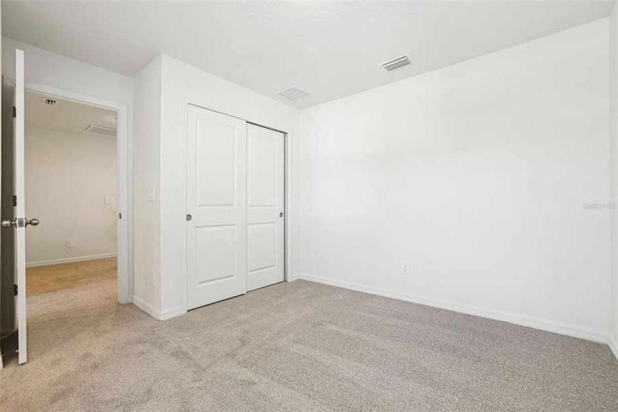 Spacious, unfurnished interior of a new home in Bradford Park, Ormond Beach (Image 23).