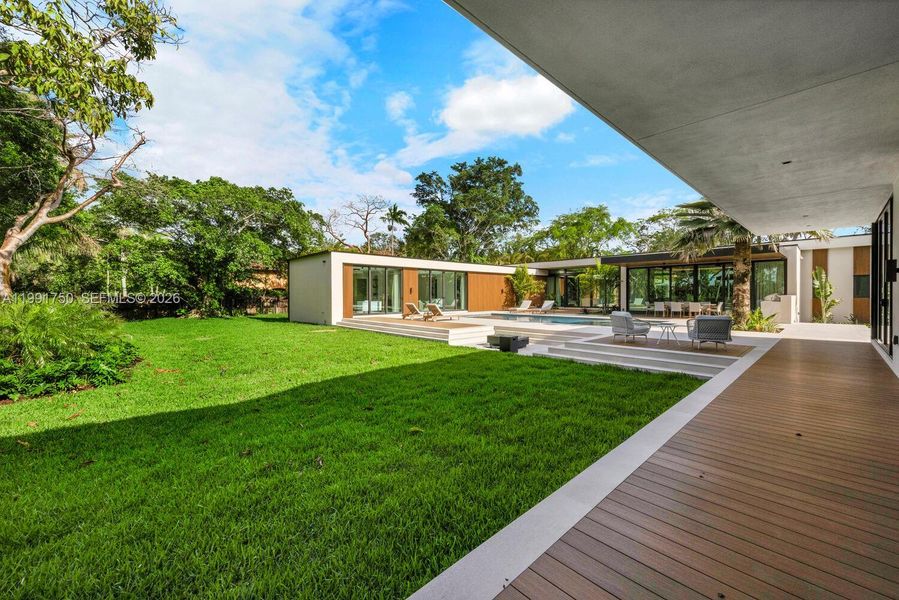 Exterior details and patio area of a home in , Pinecrest (Image 32). Exterior details and patio area of a home in , Pinecrest (Image 32).