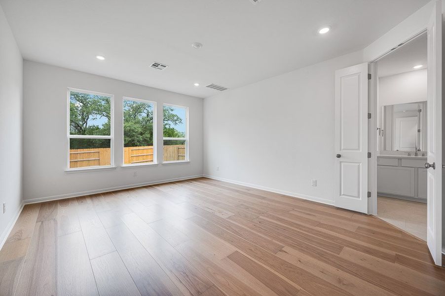 Representative unfurnished interior of a home built from the Peridot by Taylor Morrison in Santa Rita Ranch, Liberty Hill (Image 14). Representative unfurnished interior of a home built from the Peridot by Taylor Morrison in Santa Rita Ranch, Liberty Hill (Image 14).