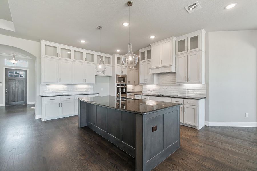 Kitchen | Concept 3634 at Hidden Creek Estates in Van Alstyne, TX by Landsea Homes