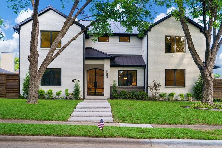 Front exterior of a new home in , Dallas, TX, highlighting curb appeal (Image 2).
