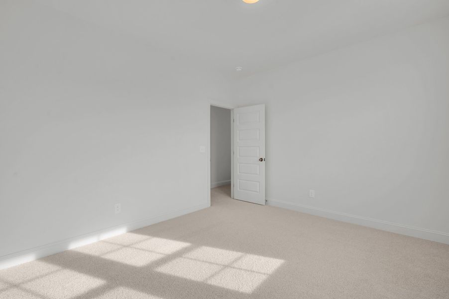 Representative unfurnished interior of a home built from the The Hampton by RobuckHomes in Windwater, Hampstead (Image 25).