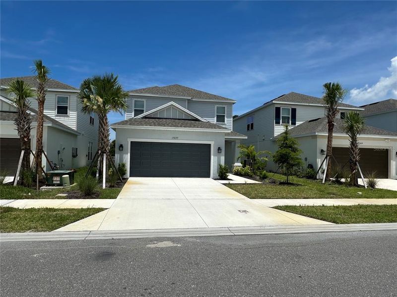 Front exterior of a new home in , Nokomis, FL, highlighting curb appeal (Image 16).