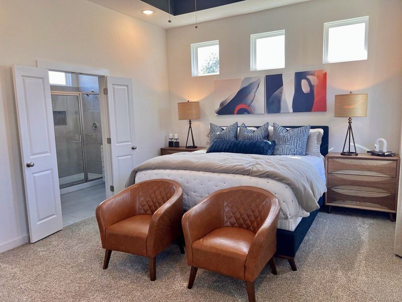 Representative furnished interior of a home built from the Saxony – 45′ Lot by Chesmar Homes in Sunterra, Katy (Image 7).