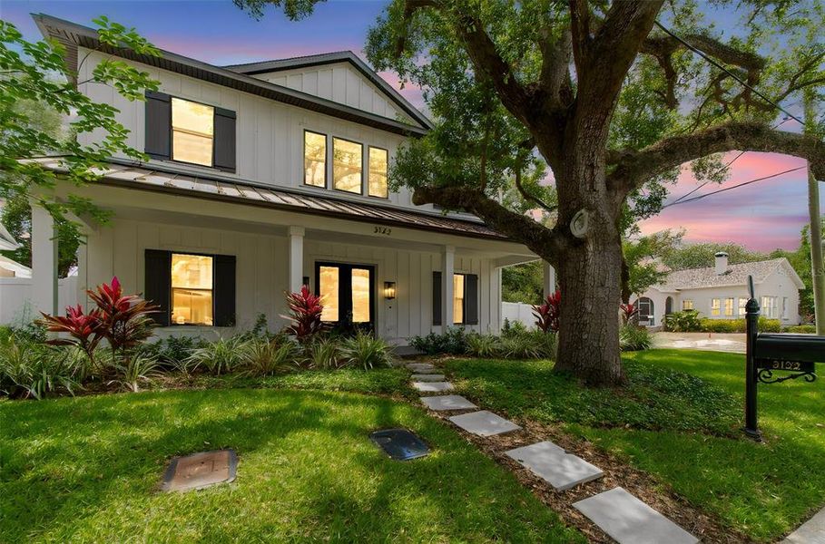 Front exterior of a new home in , Tampa, FL, highlighting curb appeal (Image 25).