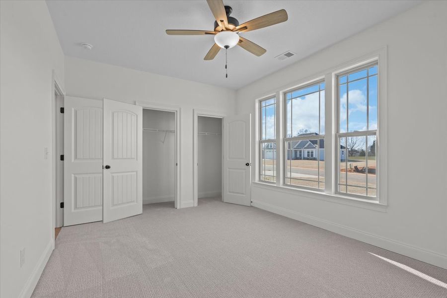 Representative unfurnished interior of a home built from the Converse by Enchanted Homes in Messer Farms, Inman (Image 31).