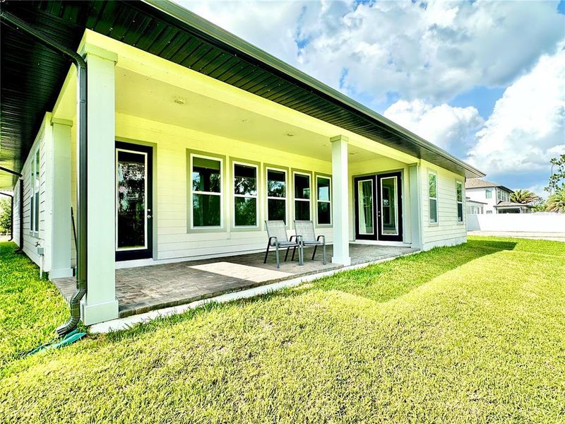 Exterior details and patio area of a home in Northlake Traditional, Winter Garden (Image 26). Exterior details and patio area of a home in Northlake Traditional, Winter Garden (Image 26).