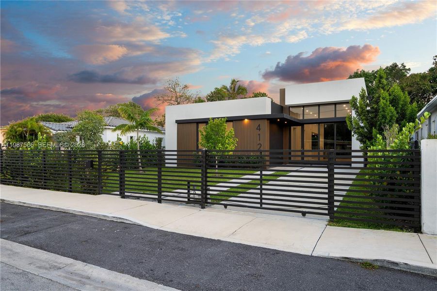 Front exterior of a new home in , Miami, FL, highlighting curb appeal (Image 23).