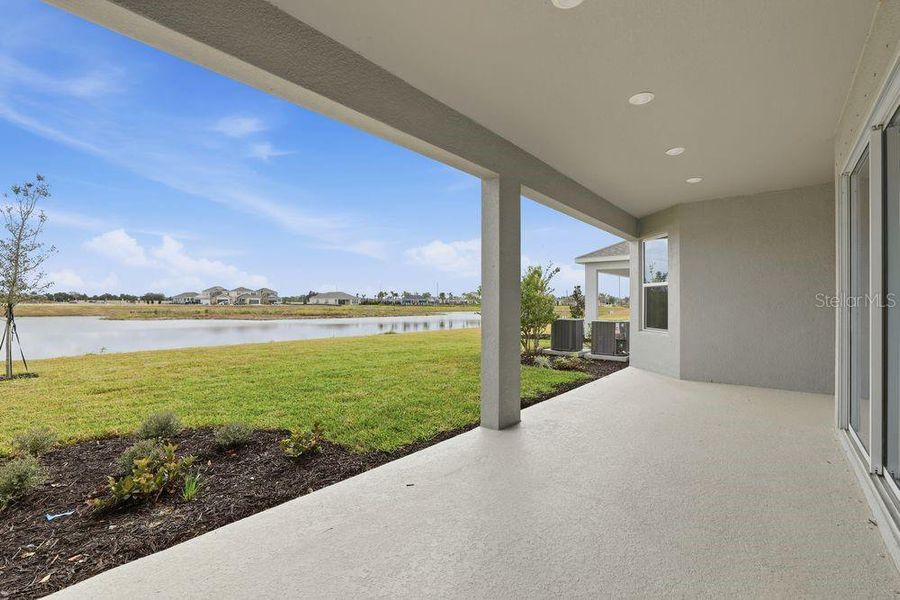 Exterior details and patio area of a home in Indigo Creek, Apollo Beach (Image 4).