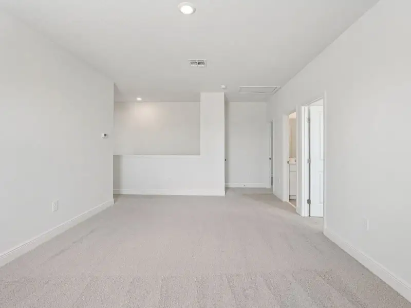 Spacious, unfurnished interior of a new home in Cyrene at Minneola, Minneola (Image 10). Spacious, unfurnished interior of a new home in Cyrene at Minneola, Minneola (Image 10).
