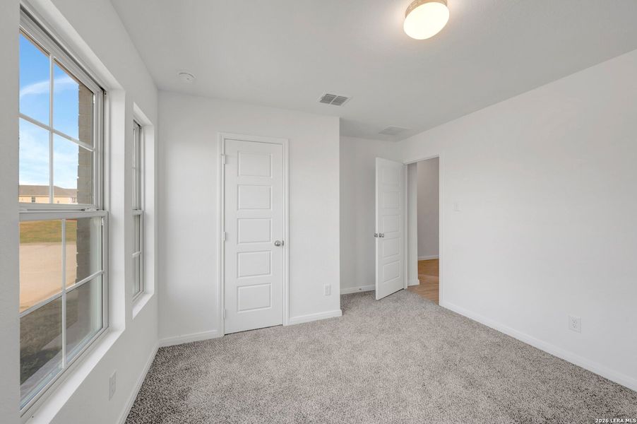Spacious, unfurnished interior of a new home in Chaparral Ranch, Floresville (Image 31).