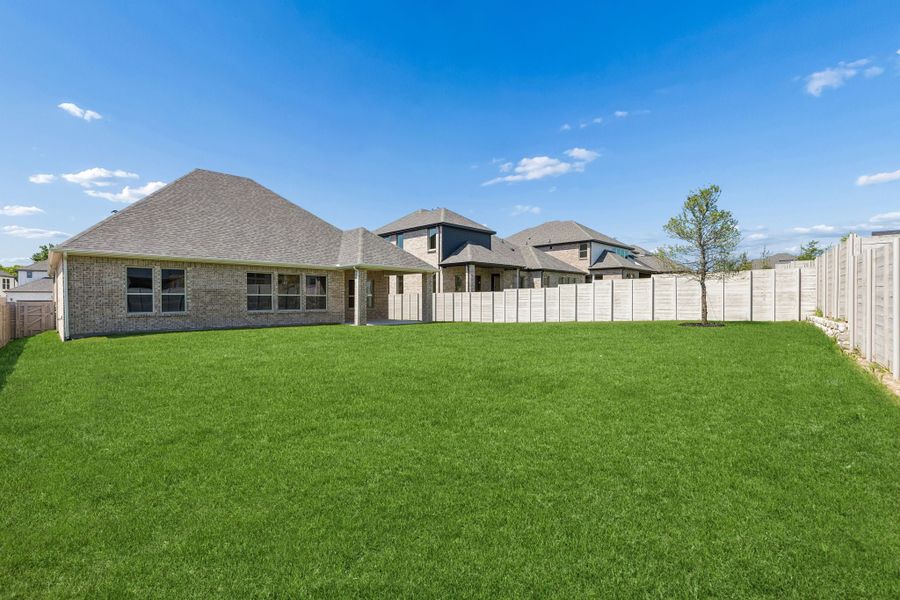Exterior details and patio area of a home in Painted Tree Lakeside, McKinney (Image 23).